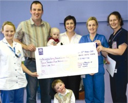 Pictured presenting a cheque for €12,450 to Letterkenny General Hospital Paediatric Ward are Kieran and Maura Toner with children Colm and Emer.