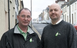 Sinn Féin members Cllr Daren Lalor and Colm Mac Lochlainn pictured wearing their Easter Lillies.